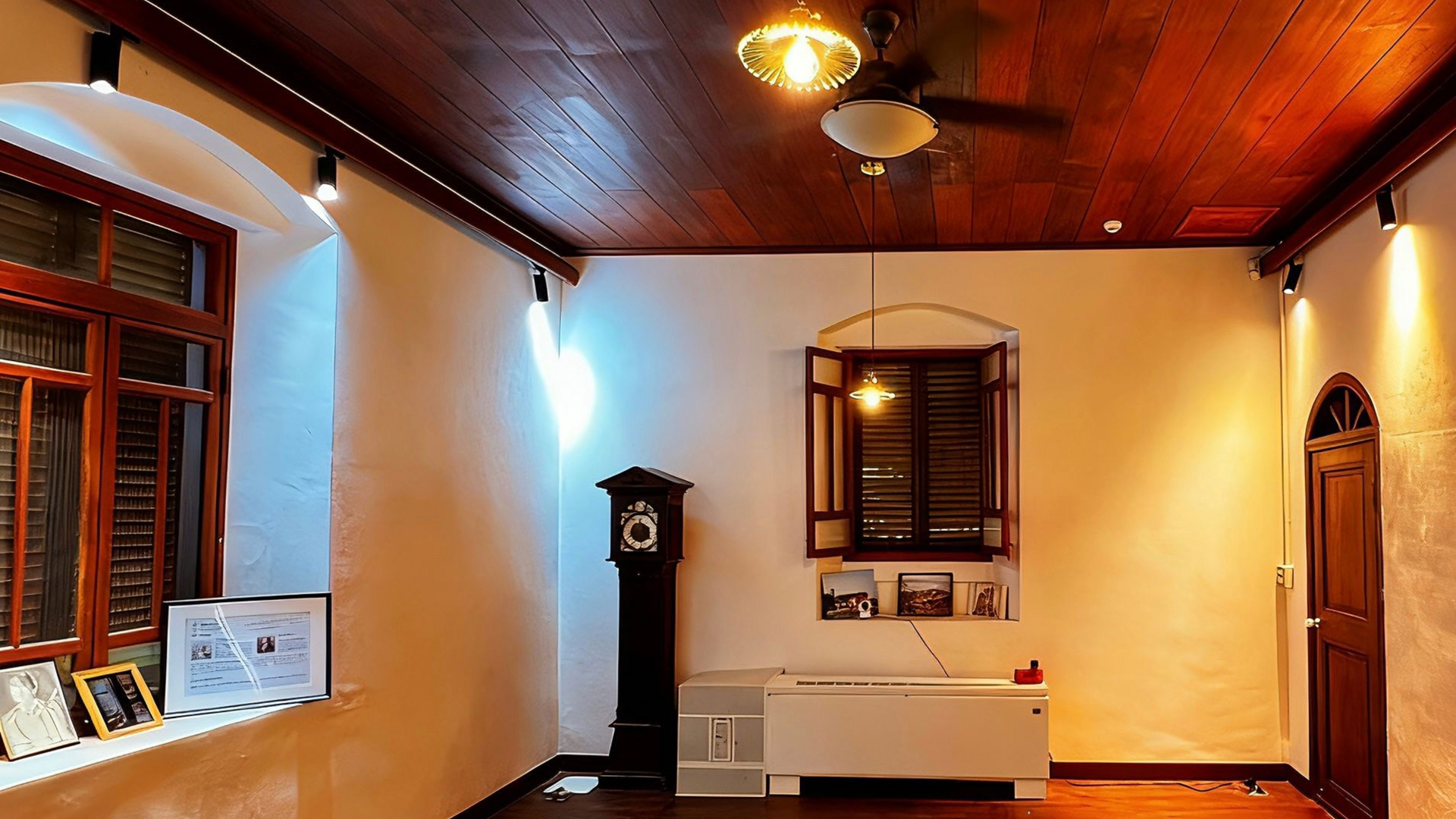 Church interior with altar, cross, lecterns, and stage. Dark wood backdrop, white screen and ceiling, and stage lights.