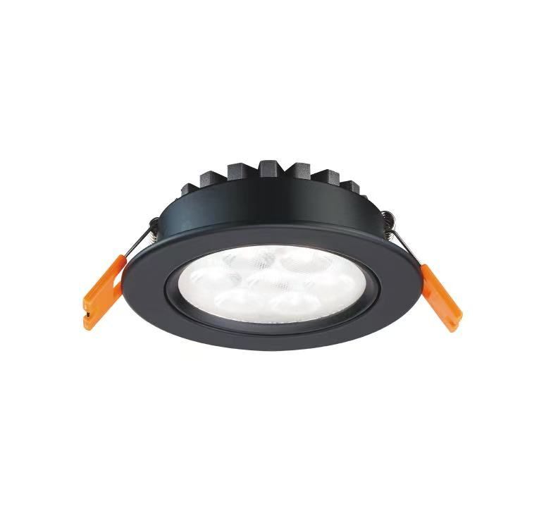 Black recessed LED ceiling light with orange spring clips.