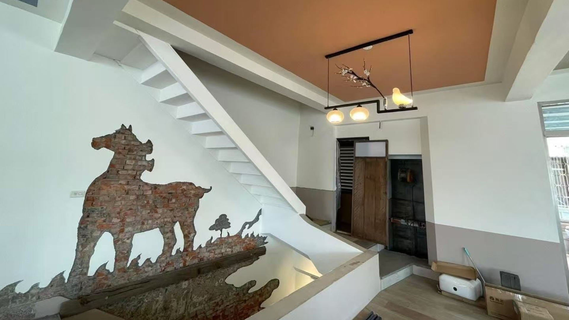 Church interior with altar, cross, lecterns, and stage. Dark wood backdrop, white screen and ceiling, and stage lights.