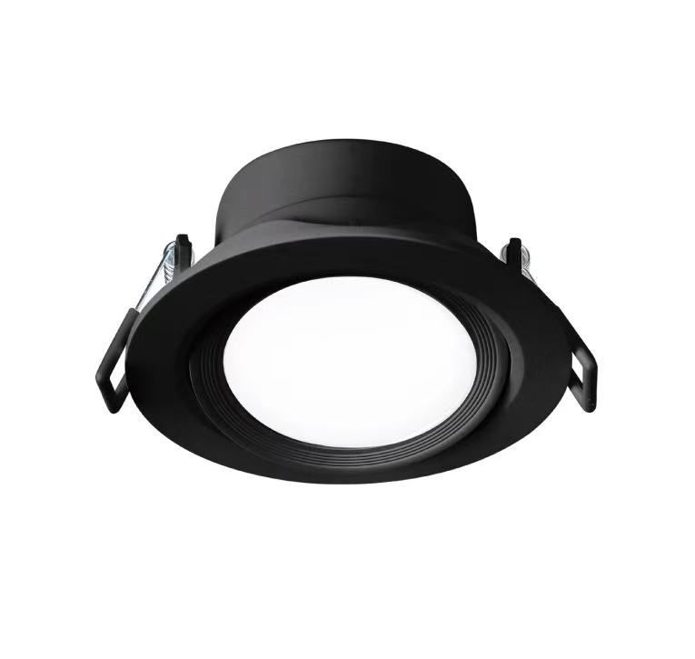 Black recessed LED spotlight with a circular light source, for ceiling installation.