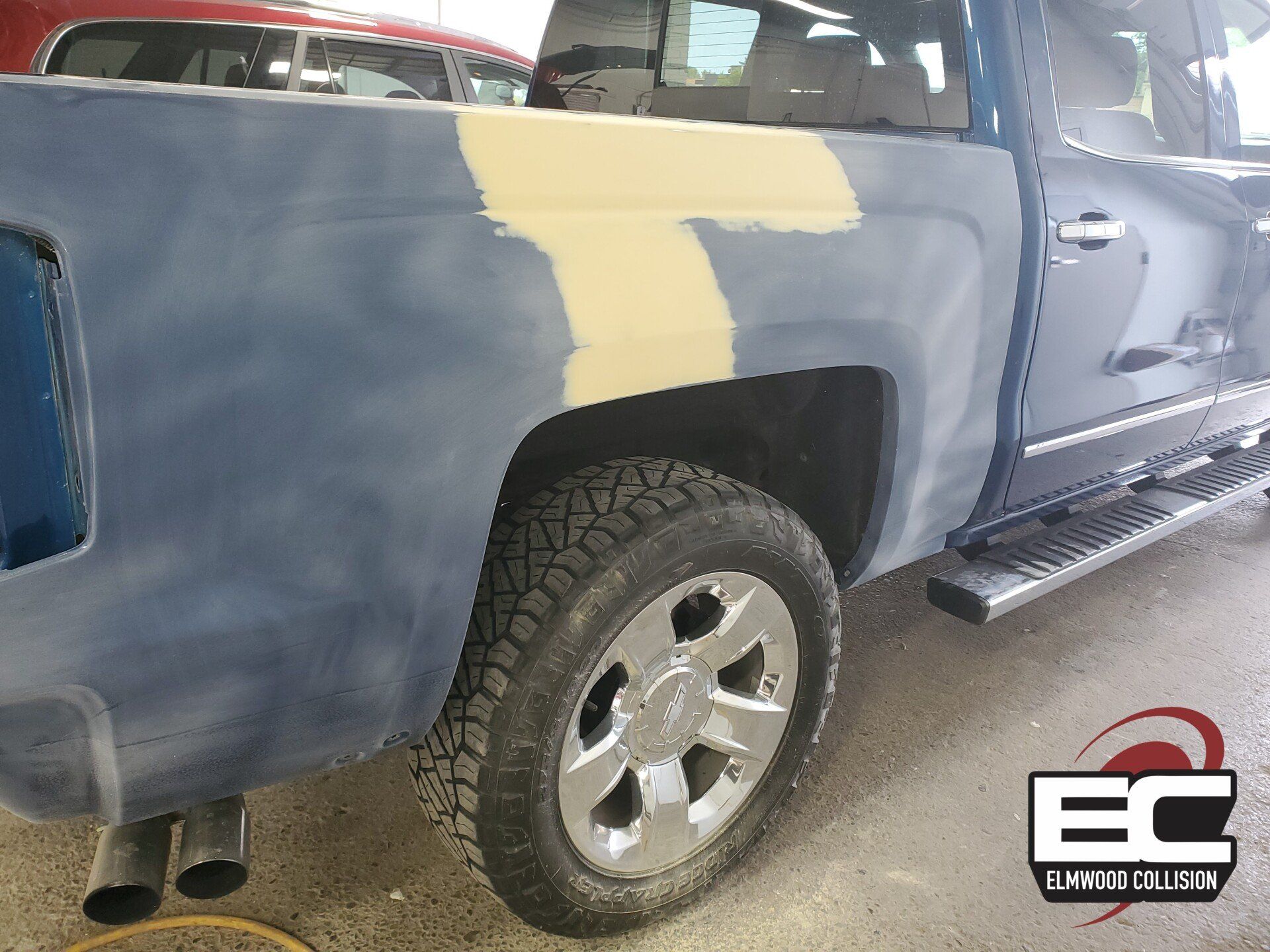 2015 Chevrolet Silverado with body work done at Elmwood Collision