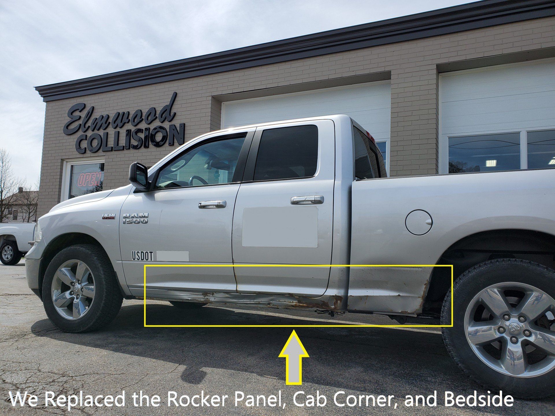 Dodge RAM 1500 with rocker panel and bedside damage at Elmwood Collision at 2700 Elmwood Ave 14217