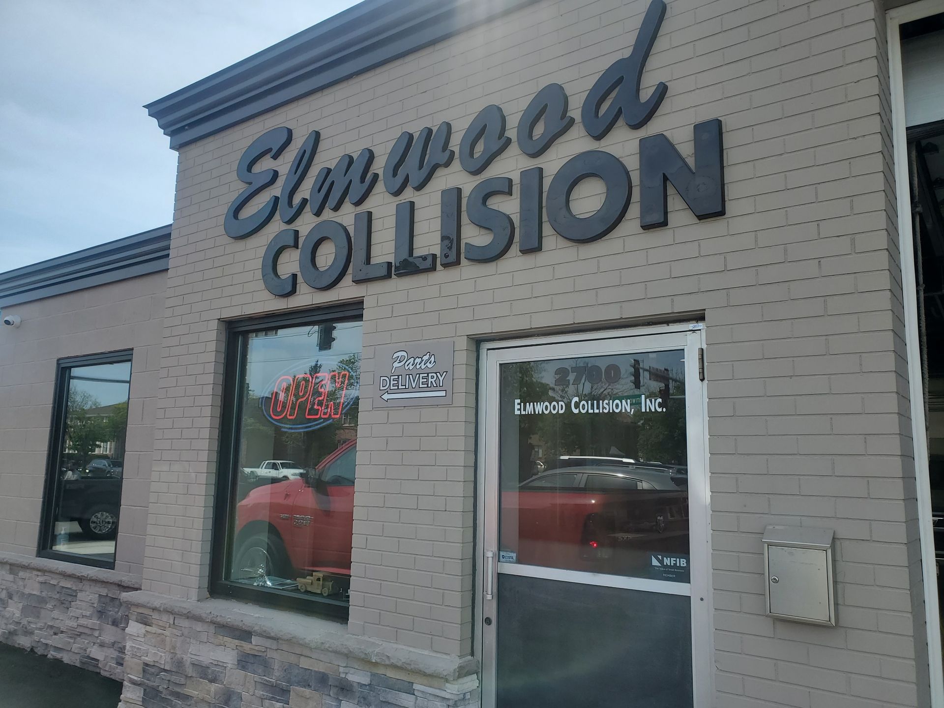 entrance to elmwood collision at 2700 elmwood avenue in kenmore, new york