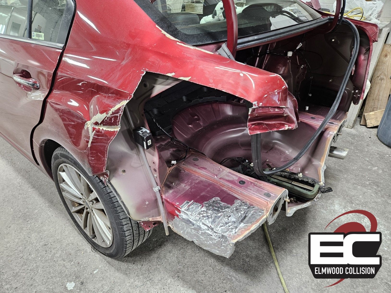 Damaged quarter panel section cut out.