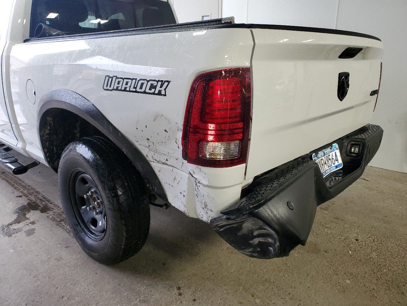 damaged truck bumper and bedside