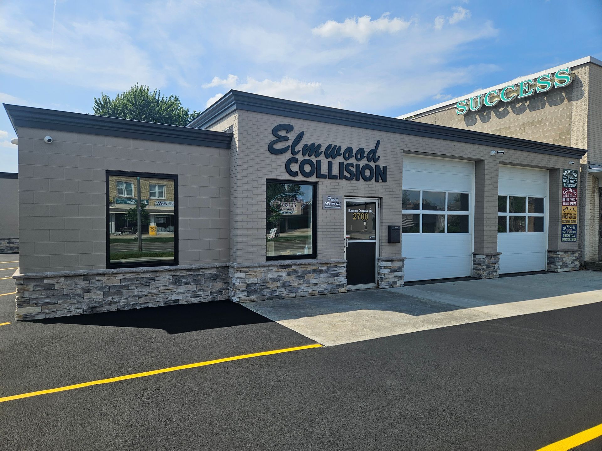 Elmwood Collision shop exterior on Elmwood Ave Kenmore NY