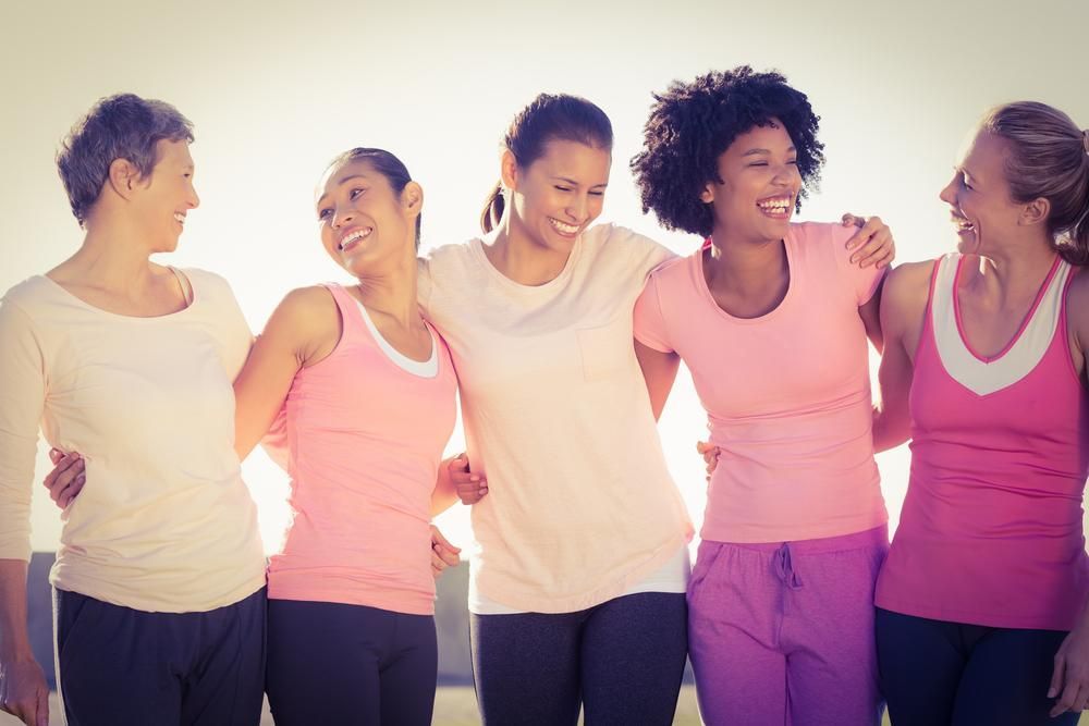 Five Diverse Women in Activewear With Arms Around Each Other — EastCoast Women's Centre In Deception Bay, QLD