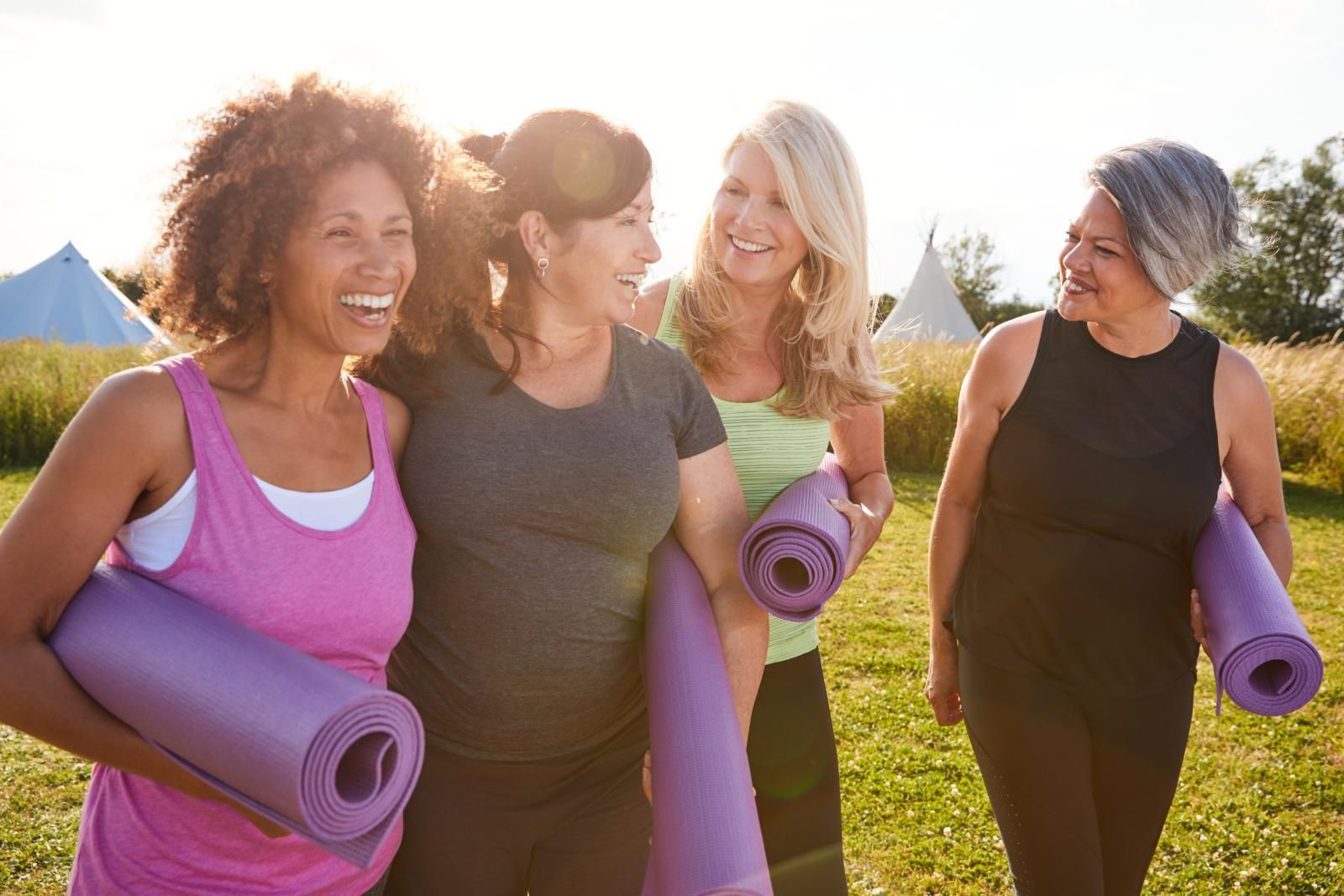 Four Diverse Women in Athletic Wear — EastCoast Women's Centre In Hervey Bay, QLD
