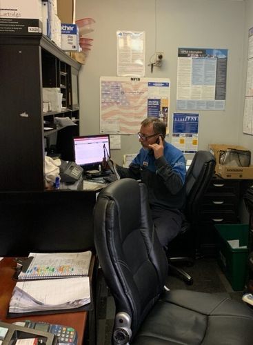 Our auto repair technician on the phone with customer in Winston-Salem, NC