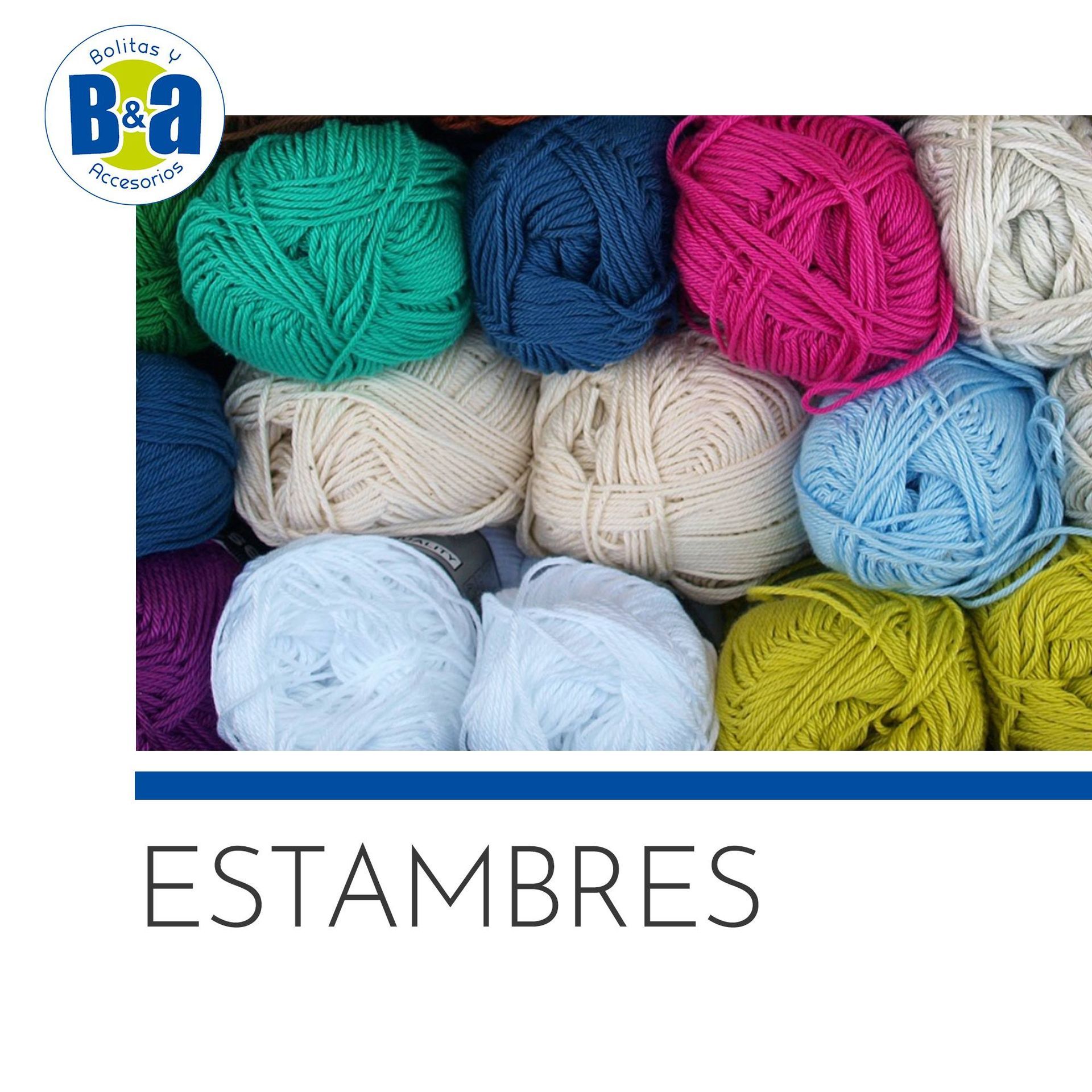 Surtido de ovillos de lana de colores etiquetados como