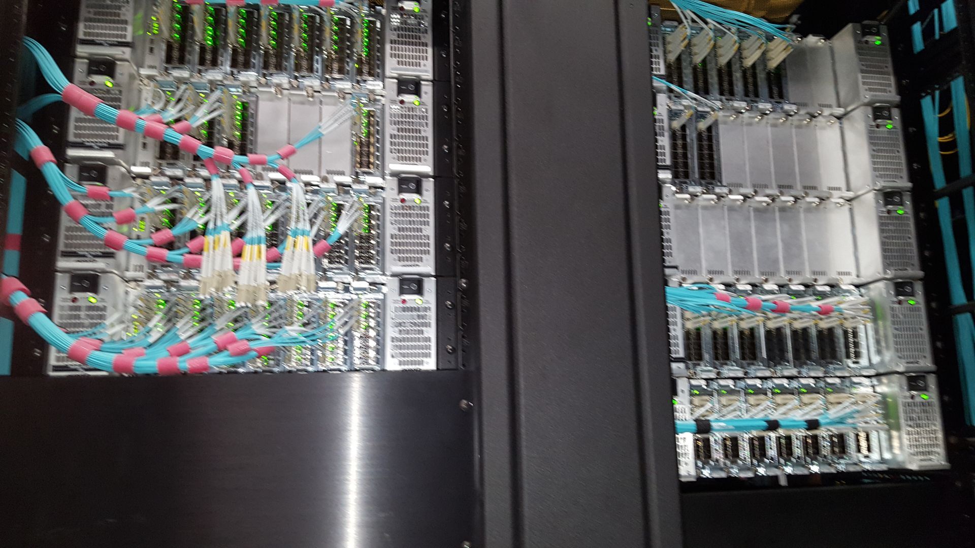 Satellite dish on a rooftop silhouetted against a sunset over a city. Satellite dish on a rooftop silhouetted against a sunset over a city.