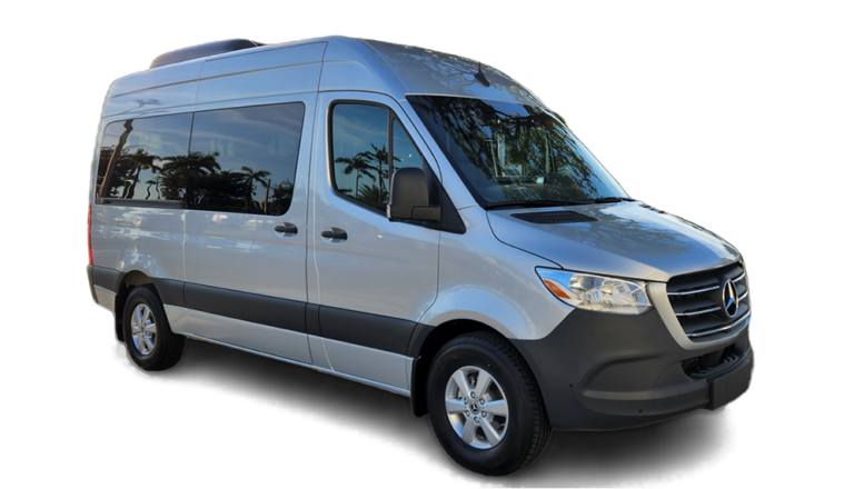 Silver Mercedes-Benz passenger van with dark tinted windows, parked against a white background.