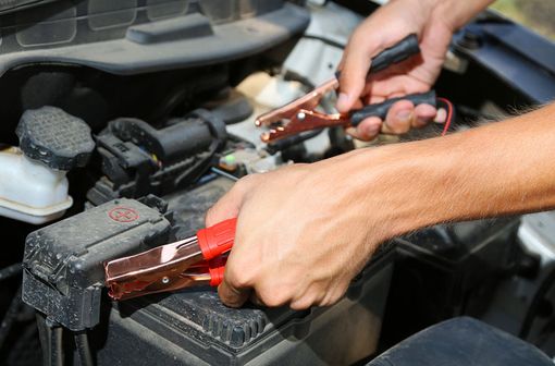 Charging a car battery with jumper cables