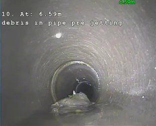 Debris in pipe image