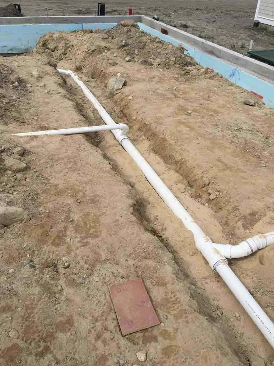 Travers Plumbing — White Large Tubes in Middletown, RI