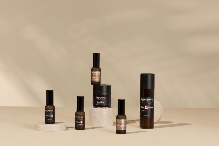 A Collection of Brown Skincare Bottles— Skin Exquisite Laser & Cosmetic Clinic in Port Macquarie, NSW