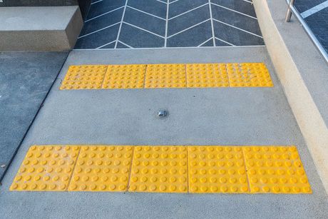 a yellow markings for blind person