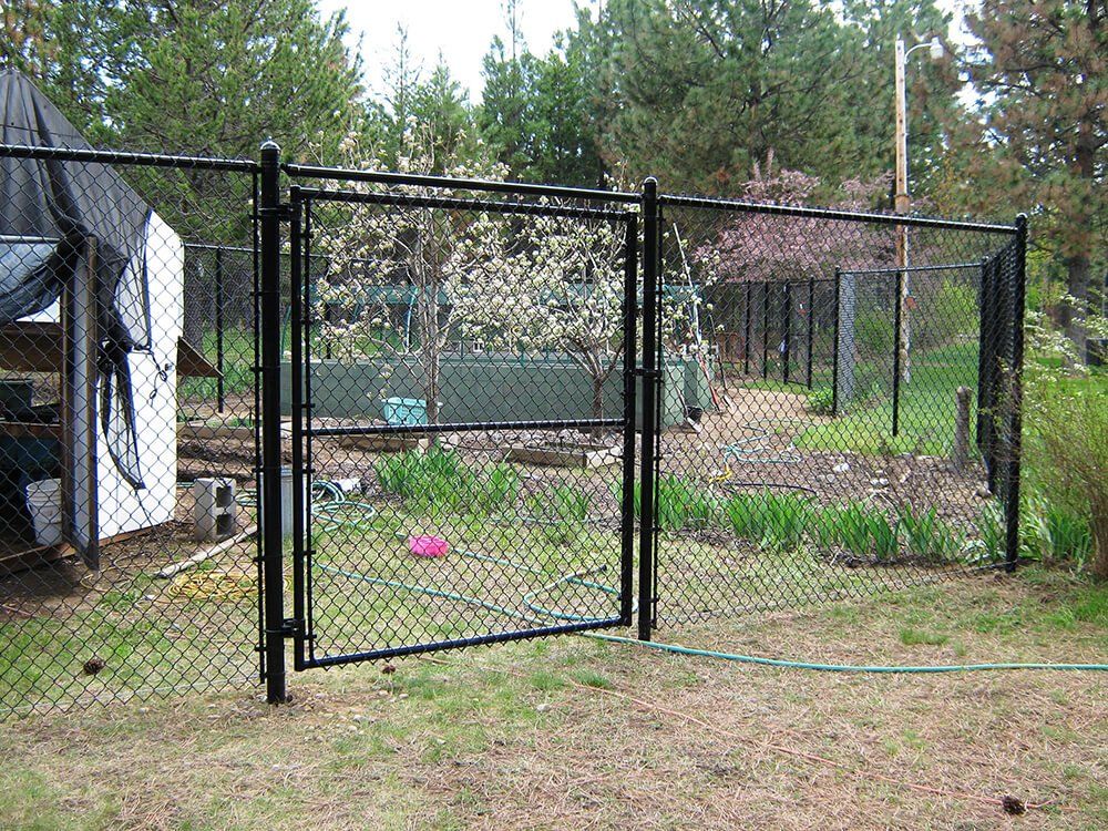 Black Chain Link in the Garden — Hayden, ID — American Fence Company