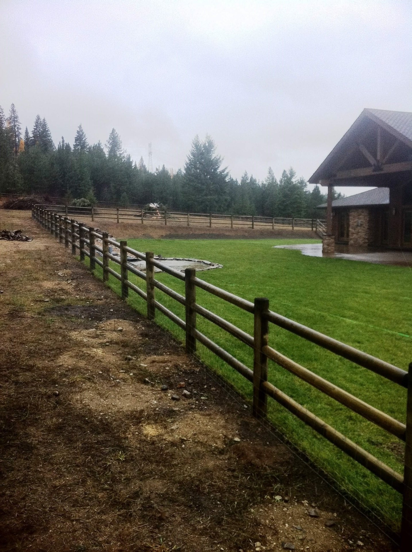 Green Wooden Fence — Hayden, ID — American Fence Company