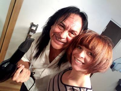 Haircuts — Stylist Holding A Blower in Albuquerque, NM