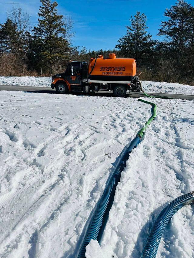 Septic truck in snow