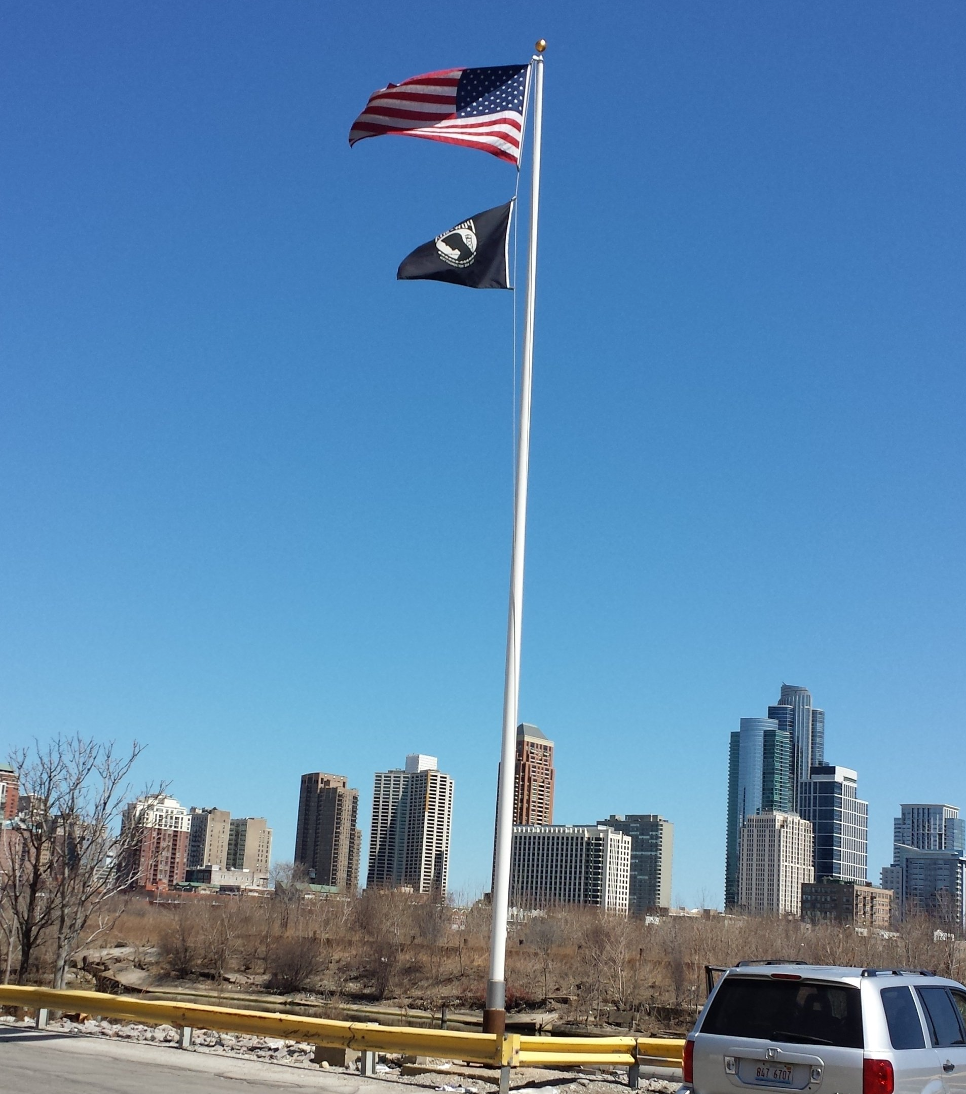 50ft Flag pole Installed by IC signs against Chicago Skyline