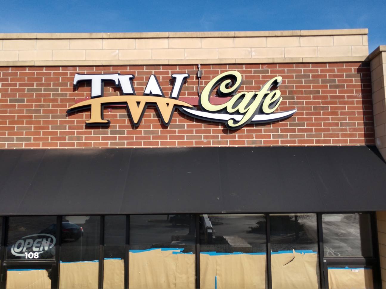 front and back lit channel letter sign tw bistro