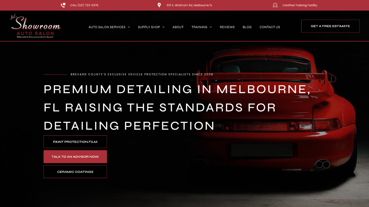 A red car is on the homepage of a website.