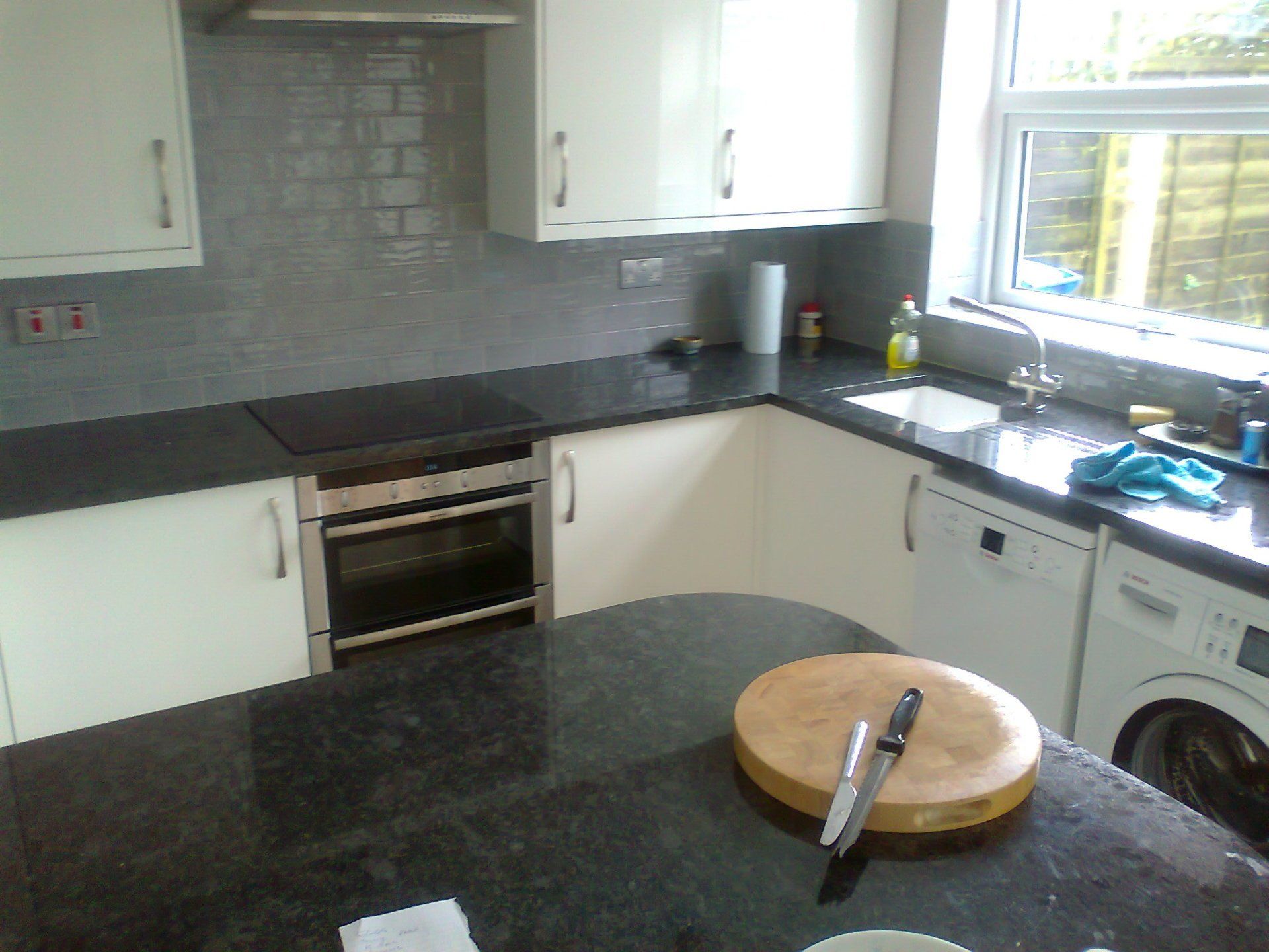 kitchen gloss white granite worktop chopping board