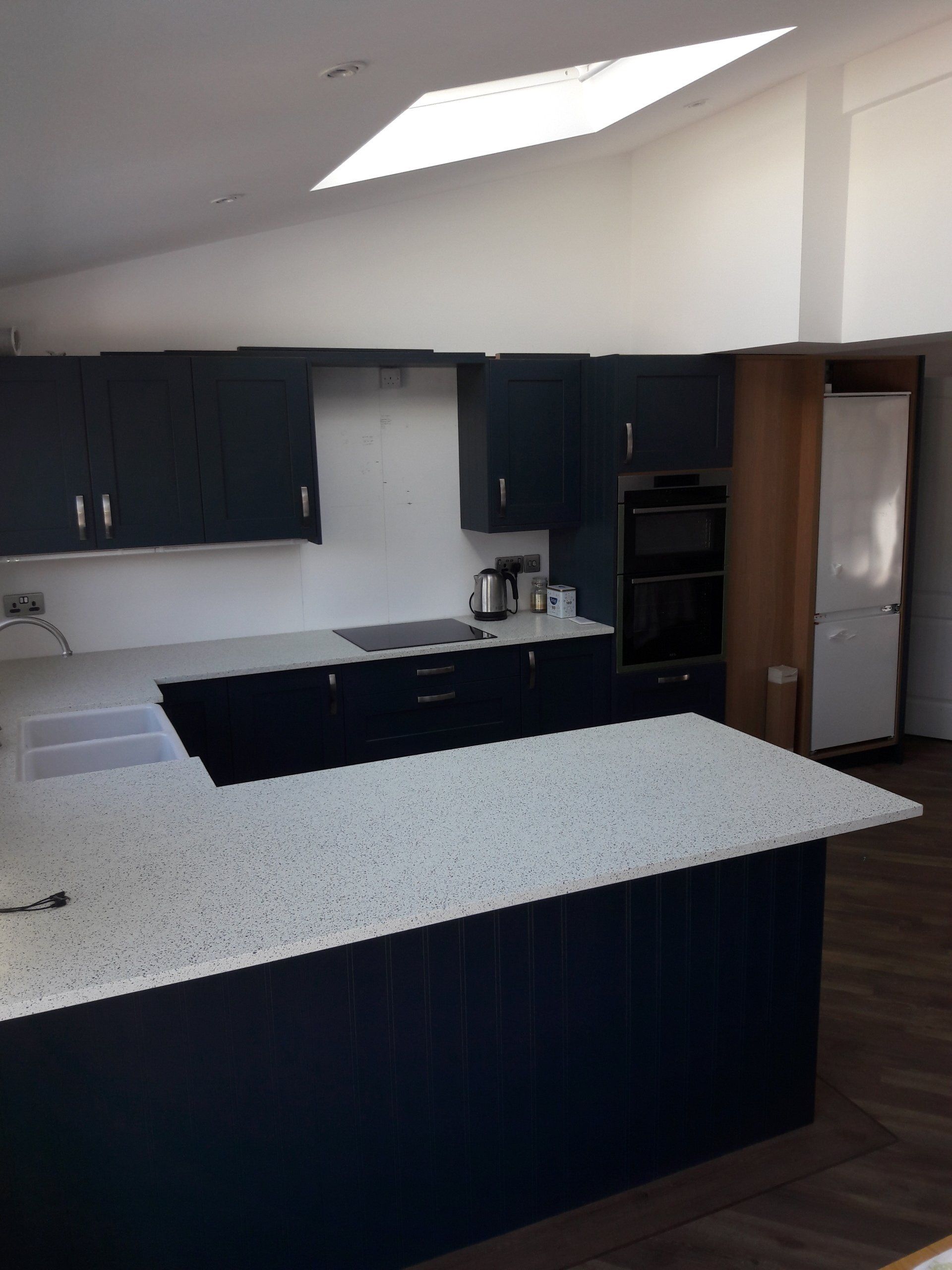 new kitchen white silestone worktop painted deep blue cabinets bespoke kitchen extension