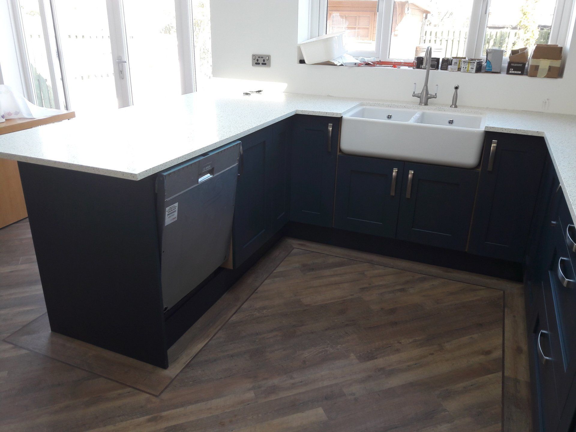 new kitchen white silestone worktop painted deep blue cabinets bespoke kitchen extension work in progress