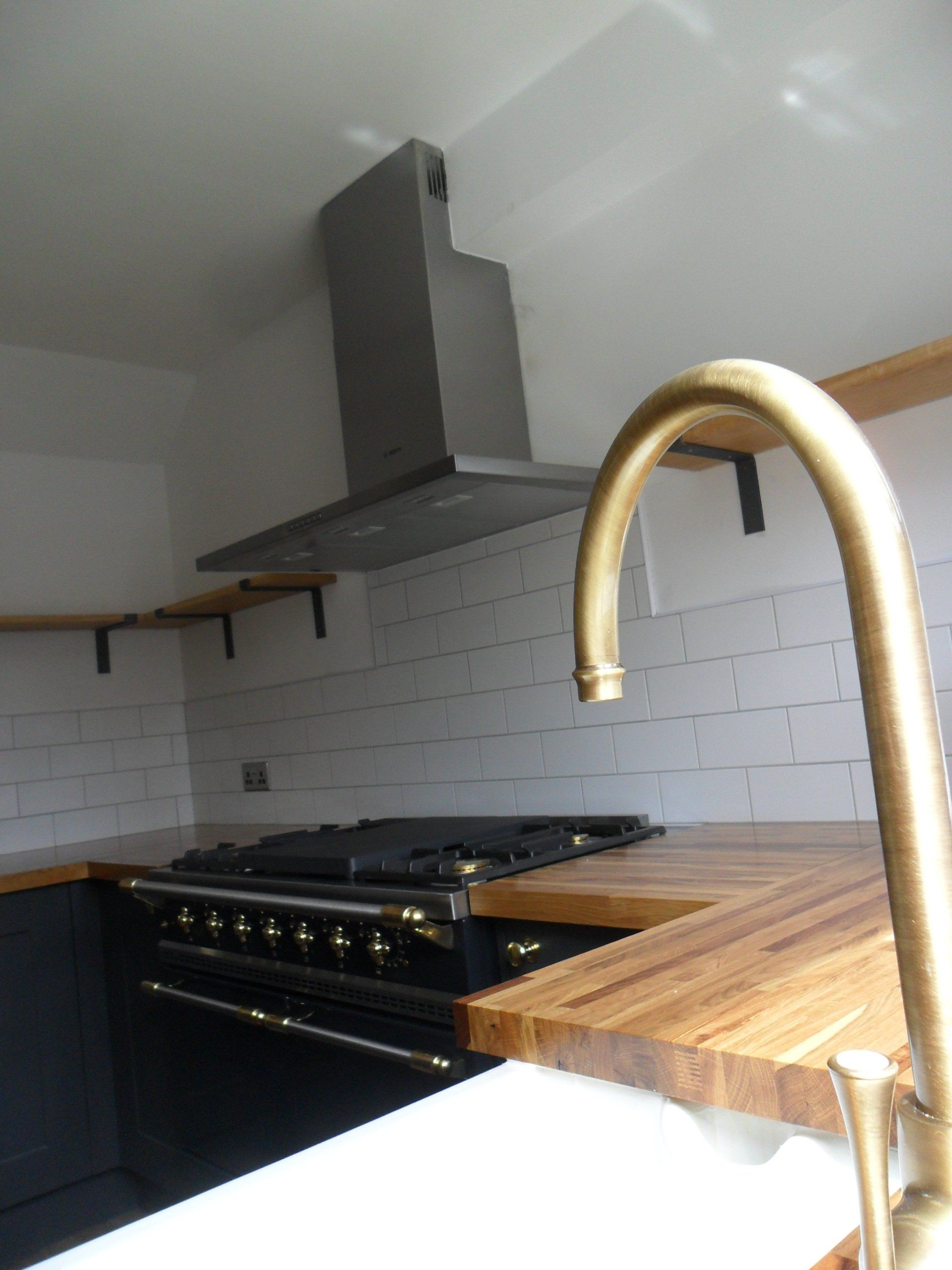 new kitchen traditional oak tops antique brass tap foreground wall tile