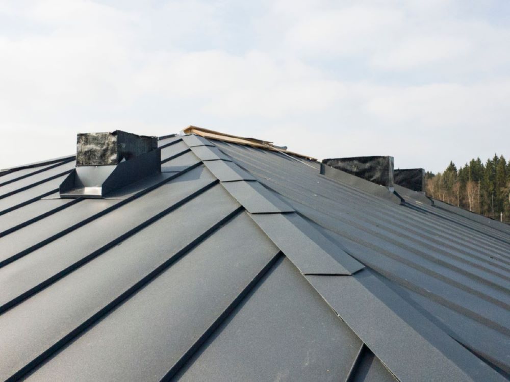 A Close Up of a Roof With a Chimney on It — Timms Roofing In Barrack Heights, NSW