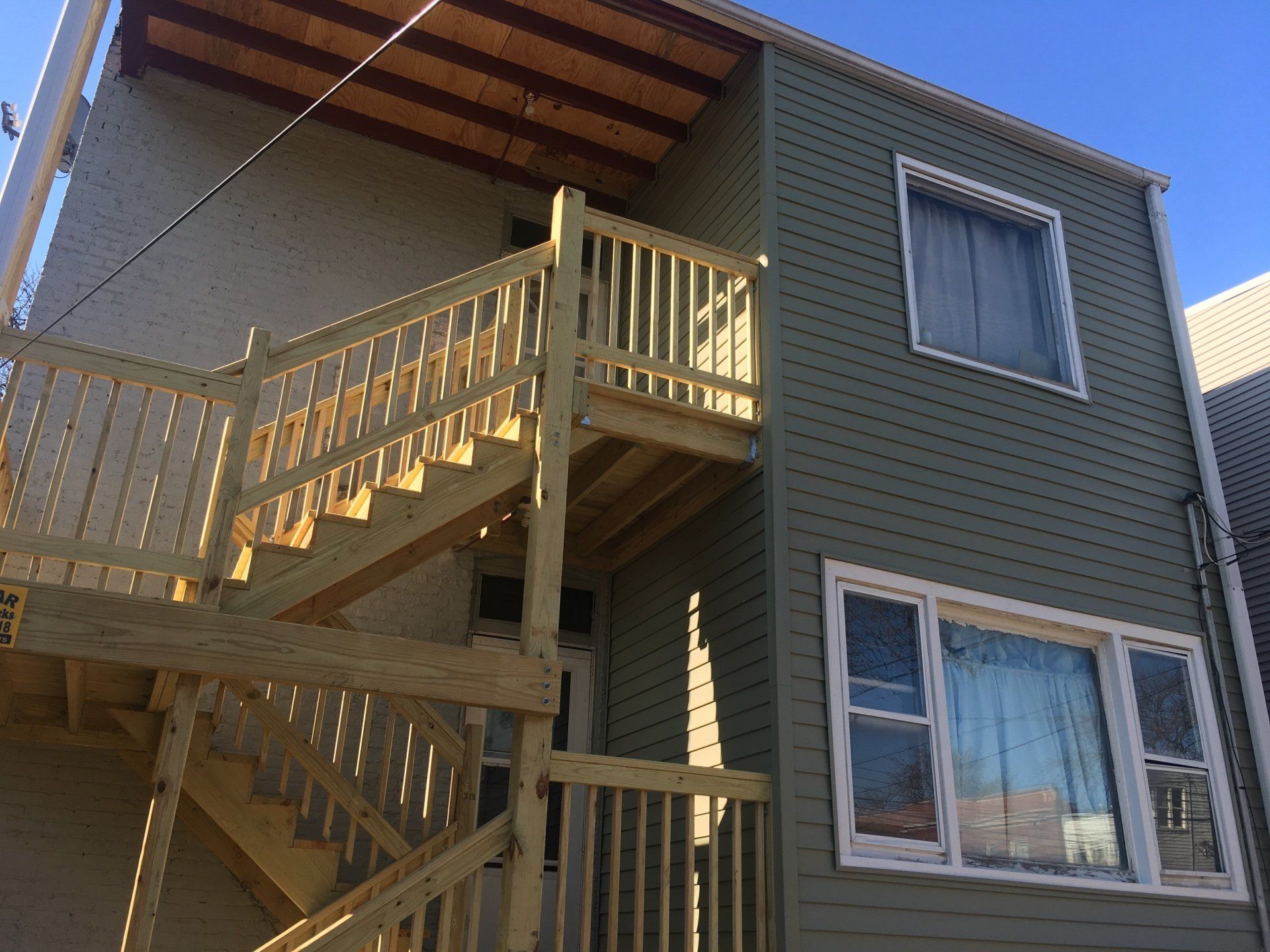 A house with stairs leading up to the second floor