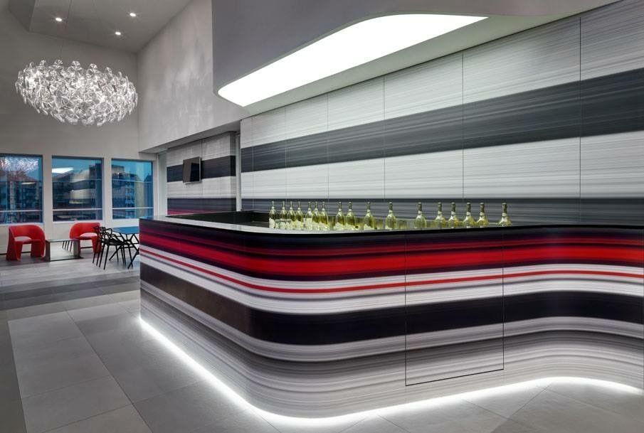 A red black and white bar with bottles on it