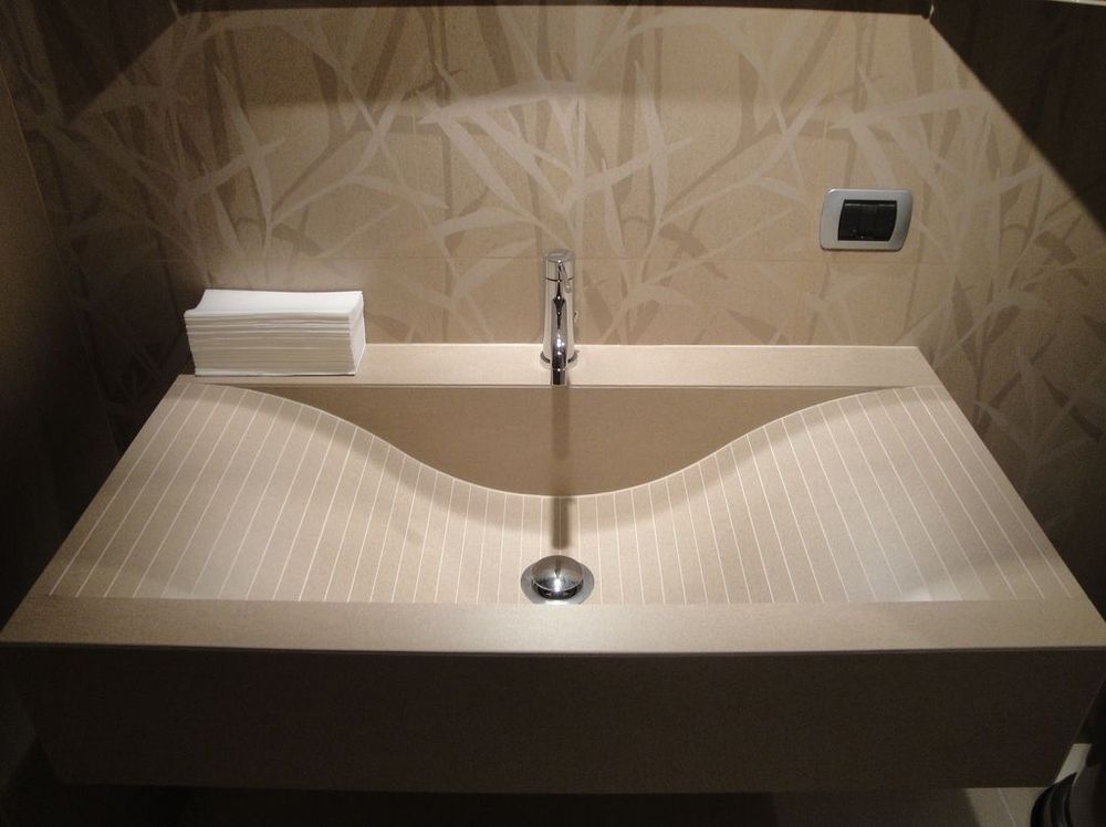 A bathroom sink with a faucet