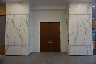 There are two doors in the middle of the room