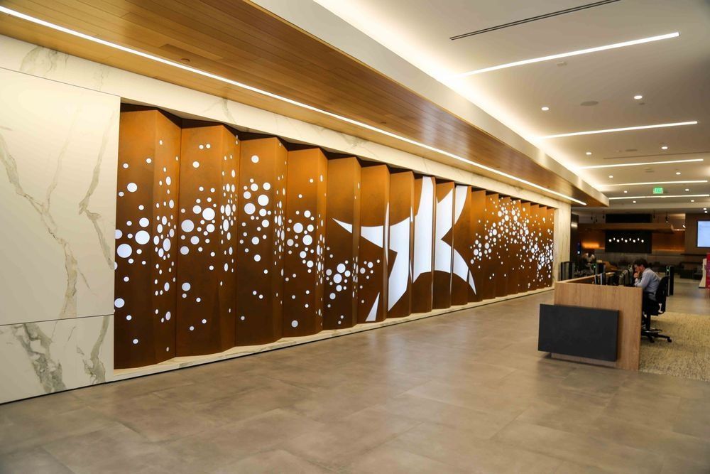 There is a large wall with a star on it in the middle of the room