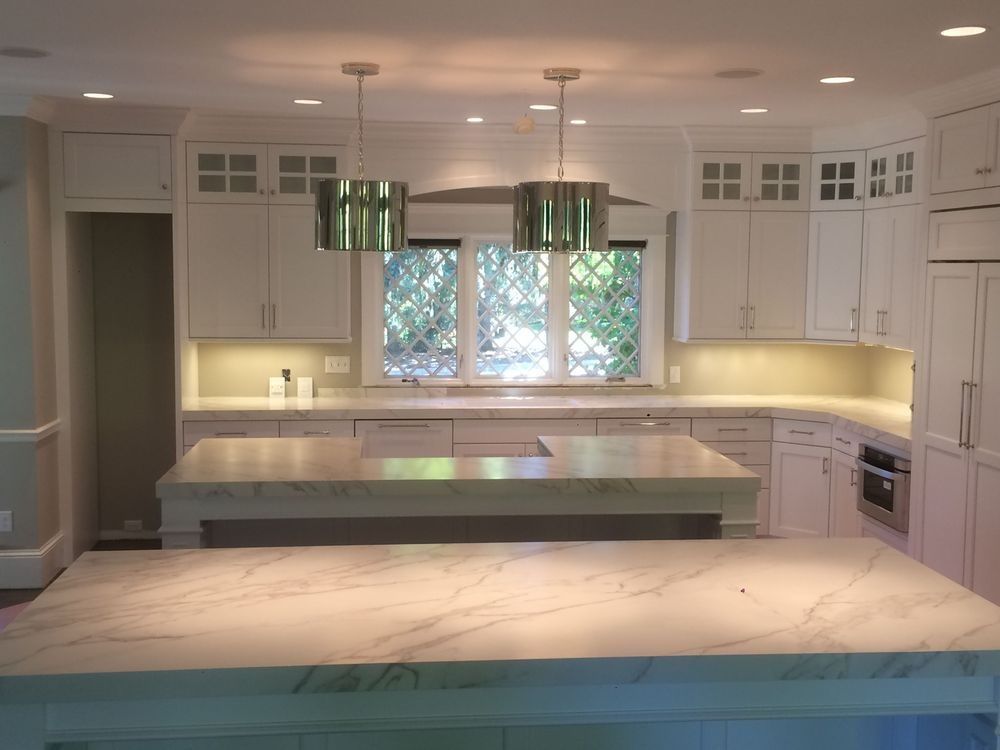 There is a large island in the middle of the kitchen