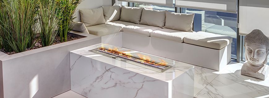 There is a fire pit in the middle of the room