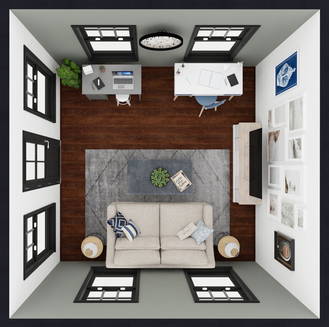 An aerial view of a living room with a couch and a desk