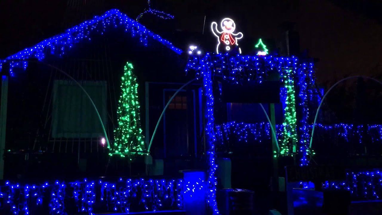 Seattle home Christmas lights - DIY blue and green LED holiday lighting display with festive decorations