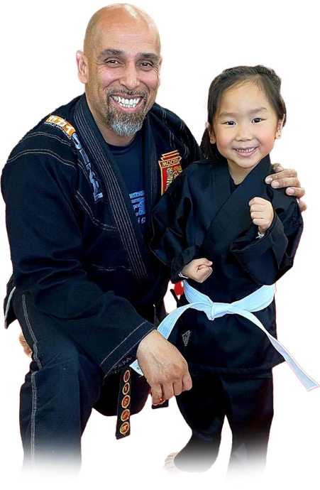 a group of children are practicing martial arts together .