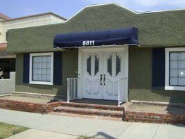 Commercial Awnings — House with Blue Awnings in Los Angeles, CA