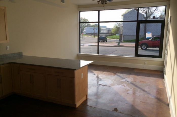 Interior view of front living area from kitchen of 801-803 N 23rd Street after renovations