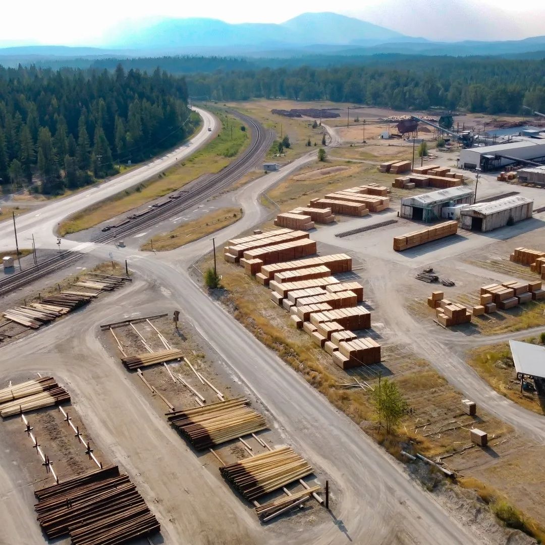 an aerial view of a warehouse filled with lots of logs