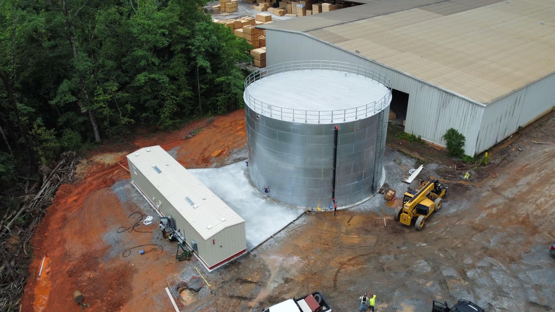 D7 pneumatics installed twin 3000 gpm diesel fire pump skid and water tank.