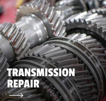 A bunch of gears with the words transmission repair below them | DAS Auto Werks