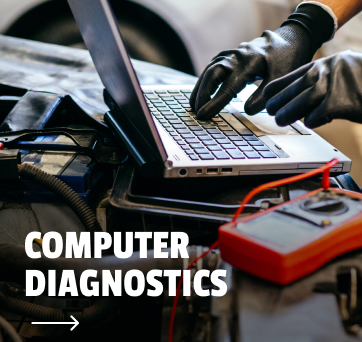 A person is using a laptop computer to do computer diagnostics | DAS Auto Werks