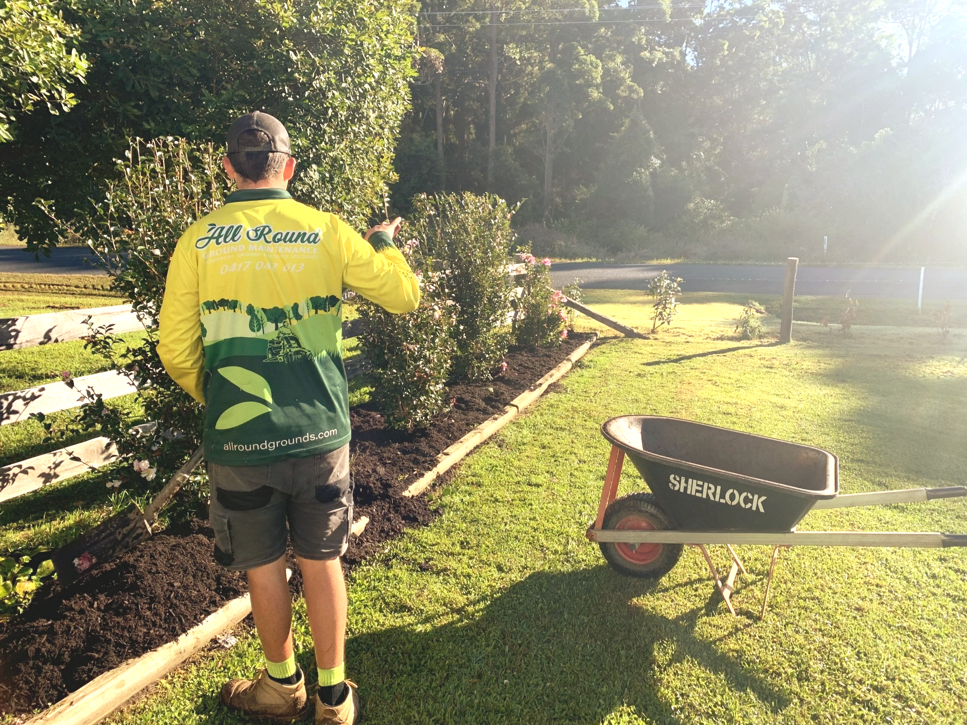 Gardener Working on The Lawn — All Round Ground Maintenance in Woolgoolga, NSW
